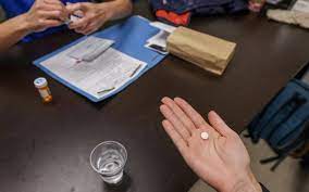 U.S. regulators say they no longer need to collect abortion pills in person
